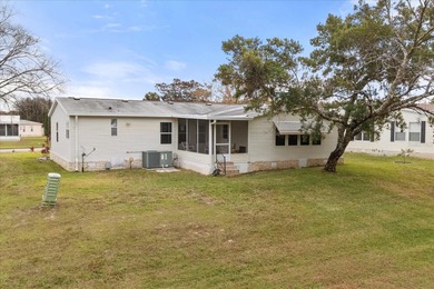 Stunning 3BR/2BA Triple-Wide with Versatile Bonus Room. $10,000 on Zellwood Station Country Club in Florida - for sale on GolfHomes.com, golf home, golf lot
