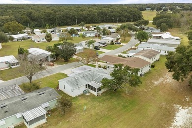 Stunning 3BR/2BA Triple-Wide with Versatile Bonus Room. $10,000 on Zellwood Station Country Club in Florida - for sale on GolfHomes.com, golf home, golf lot
