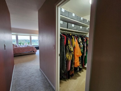 5000 Town Center living is a lifestyle! Professional on-site on Evergreen Hills Golf Course in Michigan - for sale on GolfHomes.com, golf home, golf lot