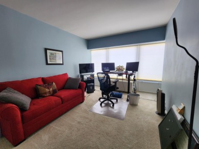 5000 Town Center living is a lifestyle! Professional on-site on Evergreen Hills Golf Course in Michigan - for sale on GolfHomes.com, golf home, golf lot