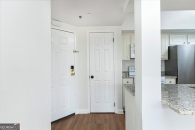 Elevated living awaits in this beautifully appointed one-bedroom on Bobby Jones Golf Club in Georgia - for sale on GolfHomes.com, golf home, golf lot