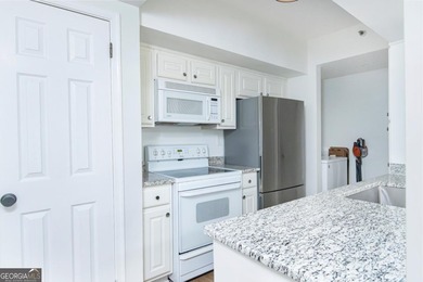 Elevated living awaits in this beautifully appointed one-bedroom on Bobby Jones Golf Club in Georgia - for sale on GolfHomes.com, golf home, golf lot