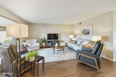 Nestled in the desirable 55+ gated community of Fountain of the on Fountain of the Sun Country Club in Arizona - for sale on GolfHomes.com, golf home, golf lot