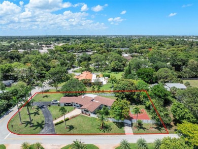 4-bedroom, 3-bathroom single-family oasis in the coveted Country on Fort Lauderdale Country Club in Florida - for sale on GolfHomes.com, golf home, golf lot