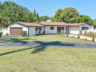 4-bedroom, 3-bathroom single-family oasis in the coveted Country on Fort Lauderdale Country Club in Florida - for sale on GolfHomes.com, golf home, golf lot