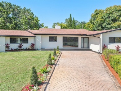 4-bedroom, 3-bathroom single-family oasis in the coveted Country on Fort Lauderdale Country Club in Florida - for sale on GolfHomes.com, golf home, golf lot