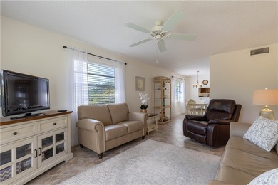 Beautifully maintained private corner unit w/gorgeous views of on Vero Beach South Golf Course in Florida - for sale on GolfHomes.com, golf home, golf lot