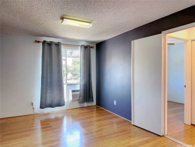 Well-priced and move-in ready, this upstairs 2-bedroom, 2-bath on Waikele Golf Club in Hawaii - for sale on GolfHomes.com, golf home, golf lot