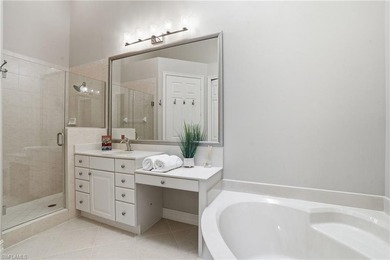 Perched on a premier corner residence in the desirable on Miromar Lakes Golf Club in Florida - for sale on GolfHomes.com, golf home, golf lot