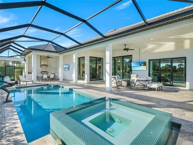 Sophisticated, serene, contemporary, and warm, this absolutely on The Golf Club At Fiddlers Creek in Florida - for sale on GolfHomes.com, golf home, golf lot