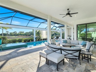 Sophisticated, serene, contemporary, and warm, this absolutely on The Golf Club At Fiddlers Creek in Florida - for sale on GolfHomes.com, golf home, golf lot
