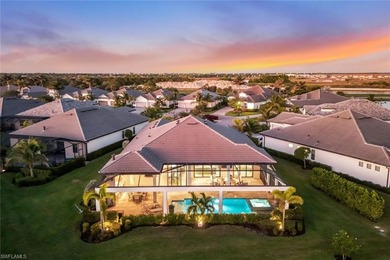 Sophisticated, serene, contemporary, and warm, this absolutely on The Golf Club At Fiddlers Creek in Florida - for sale on GolfHomes.com, golf home, golf lot