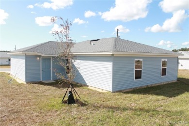 This new construction home has 4 bedrooms and two full bathrooms on Citrus Springs Country Club in Florida - for sale on GolfHomes.com, golf home, golf lot