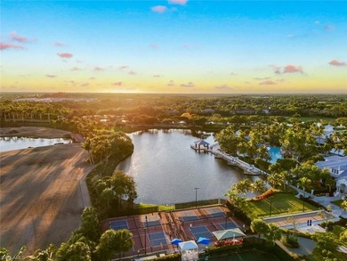 Sophisticated, serene, contemporary, and warm, this absolutely on The Golf Club At Fiddlers Creek in Florida - for sale on GolfHomes.com, golf home, golf lot