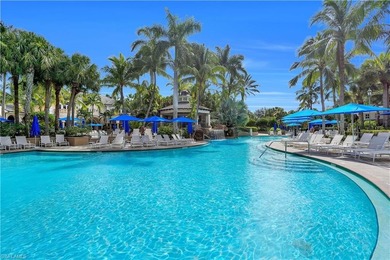 Sophisticated, serene, contemporary, and warm, this absolutely on The Golf Club At Fiddlers Creek in Florida - for sale on GolfHomes.com, golf home, golf lot