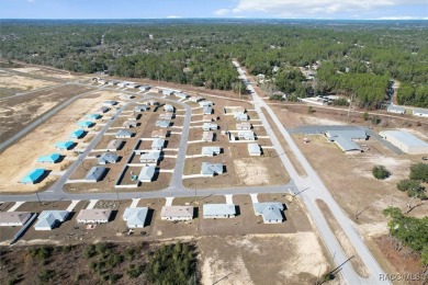 This new construction home has 4 bedrooms and two full bathrooms on Citrus Springs Country Club in Florida - for sale on GolfHomes.com, golf home, golf lot