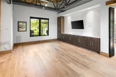 Experience luxury redefined in this private 6,021 SqFt custom on The Traditions Club At Texas A and M in Texas - for sale on GolfHomes.com, golf home, golf lot