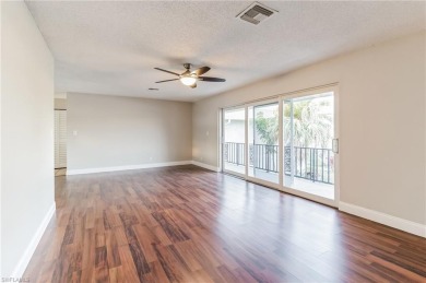 Wonderful second floor unit looking out on the water of the on The Glades Golf and Country Club in Florida - for sale on GolfHomes.com, golf home, golf lot