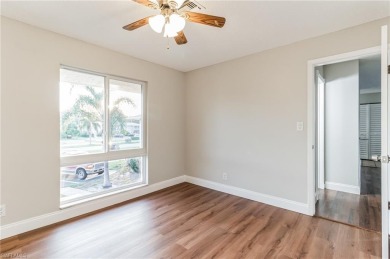 Wonderful second floor unit looking out on the water of the on The Glades Golf and Country Club in Florida - for sale on GolfHomes.com, golf home, golf lot