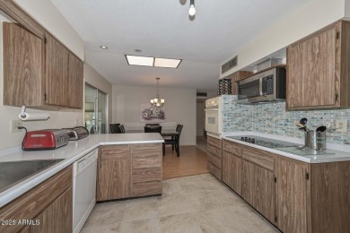 This welcoming ''Gemini'' Home features 2 Bedrooms, 2 Baths and on Sun City Lakes West and East in Arizona - for sale on GolfHomes.com, golf home, golf lot