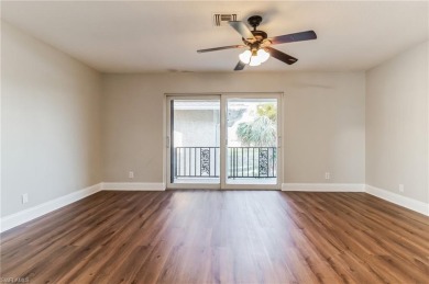 Wonderful second floor unit looking out on the water of the on The Glades Golf and Country Club in Florida - for sale on GolfHomes.com, golf home, golf lot