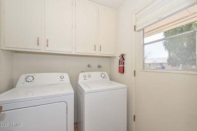 This welcoming ''Gemini'' Home features 2 Bedrooms, 2 Baths and on Sun City Lakes West and East in Arizona - for sale on GolfHomes.com, golf home, golf lot
