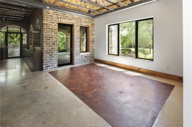 Experience luxury redefined in this private 6,021 SqFt custom on The Traditions Club At Texas A and M in Texas - for sale on GolfHomes.com, golf home, golf lot