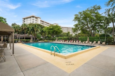 SPECTACULAR GOLF COURSE VIEWS FROM THIS BEAUTIFULLY UPGRADED on Palm-Aire Country Club and Resort - Palms in Florida - for sale on GolfHomes.com, golf home, golf lot