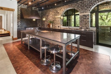 Experience luxury redefined in this private 6,021 SqFt custom on The Traditions Club At Texas A and M in Texas - for sale on GolfHomes.com, golf home, golf lot