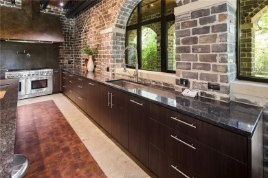 Experience luxury redefined in this private 6,021 SqFt custom on The Traditions Club At Texas A and M in Texas - for sale on GolfHomes.com, golf home, golf lot