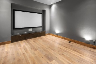 Experience luxury redefined in this private 6,021 SqFt custom on The Traditions Club At Texas A and M in Texas - for sale on GolfHomes.com, golf home, golf lot