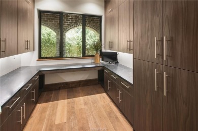 Experience luxury redefined in this private 6,021 SqFt custom on The Traditions Club At Texas A and M in Texas - for sale on GolfHomes.com, golf home, golf lot