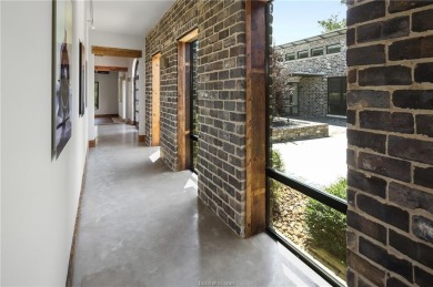 Experience luxury redefined in this private 6,021 SqFt custom on The Traditions Club At Texas A and M in Texas - for sale on GolfHomes.com, golf home, golf lot