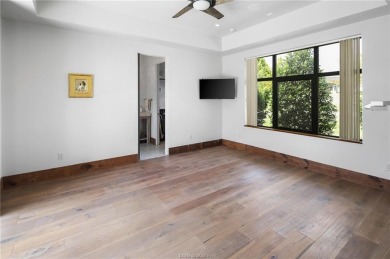 Experience luxury redefined in this private 6,021 SqFt custom on The Traditions Club At Texas A and M in Texas - for sale on GolfHomes.com, golf home, golf lot