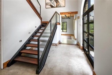 Experience luxury redefined in this private 6,021 SqFt custom on The Traditions Club At Texas A and M in Texas - for sale on GolfHomes.com, golf home, golf lot