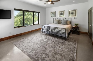 Experience luxury redefined in this private 6,021 SqFt custom on The Traditions Club At Texas A and M in Texas - for sale on GolfHomes.com, golf home, golf lot