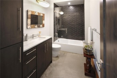 Experience luxury redefined in this private 6,021 SqFt custom on The Traditions Club At Texas A and M in Texas - for sale on GolfHomes.com, golf home, golf lot