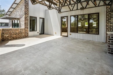 Experience luxury redefined in this private 6,021 SqFt custom on The Traditions Club At Texas A and M in Texas - for sale on GolfHomes.com, golf home, golf lot