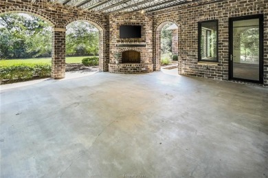 Experience luxury redefined in this private 6,021 SqFt custom on The Traditions Club At Texas A and M in Texas - for sale on GolfHomes.com, golf home, golf lot