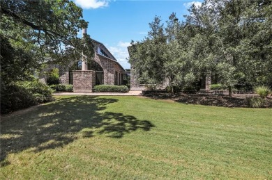 Experience luxury redefined in this private 6,021 SqFt custom on The Traditions Club At Texas A and M in Texas - for sale on GolfHomes.com, golf home, golf lot