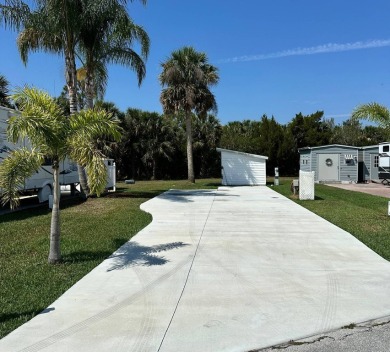 Now is the time to own this great RV site as a winter retreat on The Great Outdoors Golf and Country Club in Florida - for sale on GolfHomes.com, golf home, golf lot