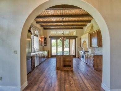 This two-story residence is designed as a unique retreat at on Escondido Golf and Lake Club  in Texas - for sale on GolfHomes.com, golf home, golf lot