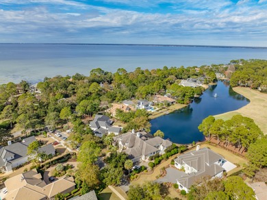 Luxurious Lakefront Living on Burnt Pine's Hole 6. This 4BR/4BA on Sandestin Golf and Beach Resort - Raven in Florida - for sale on GolfHomes.com, golf home, golf lot