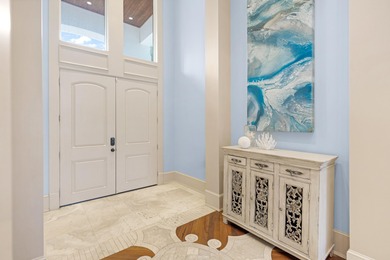 Luxurious Lakefront Living on Burnt Pine's Hole 6. This 4BR/4BA on Sandestin Golf and Beach Resort - Raven in Florida - for sale on GolfHomes.com, golf home, golf lot