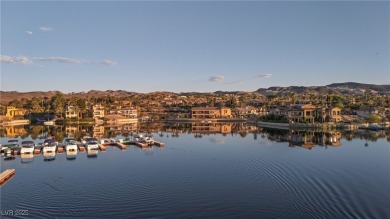 Premier lakefront, one level condo nestled in the exclusive on South Shore At Lake Las Vegas in Nevada - for sale on GolfHomes.com, golf home, golf lot