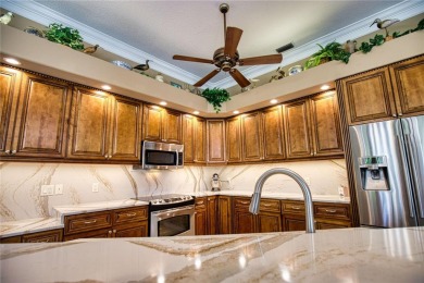 LOOK NO FURTHER FOR THE PERFECTLY UPDATED HOME IN CALUSA LAKES! on Calusa Lakes Golf Club in Florida - for sale on GolfHomes.com, golf home, golf lot