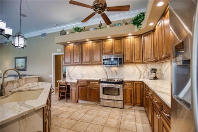 LOOK NO FURTHER FOR THE PERFECTLY UPDATED HOME IN CALUSA LAKES! on Calusa Lakes Golf Club in Florida - for sale on GolfHomes.com, golf home, golf lot