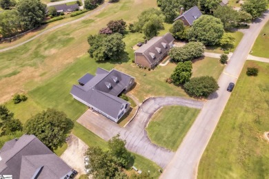 Nestled on the 7th hole of the scenic Pickens County Club Golf on Pickens Country Club in South Carolina - for sale on GolfHomes.com, golf home, golf lot