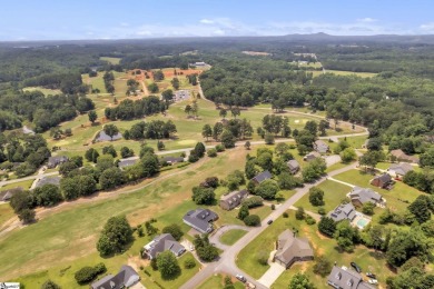 Nestled on the 7th hole of the scenic Pickens County Club Golf on Pickens Country Club in South Carolina - for sale on GolfHomes.com, golf home, golf lot
