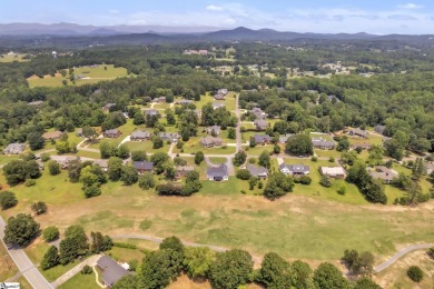 Nestled on the 7th hole of the scenic Pickens County Club Golf on Pickens Country Club in South Carolina - for sale on GolfHomes.com, golf home, golf lot